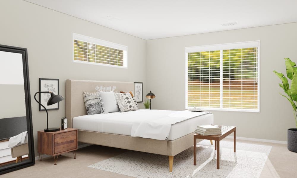 This stylish bedroom is all about neutral colors and a little hollywood glam